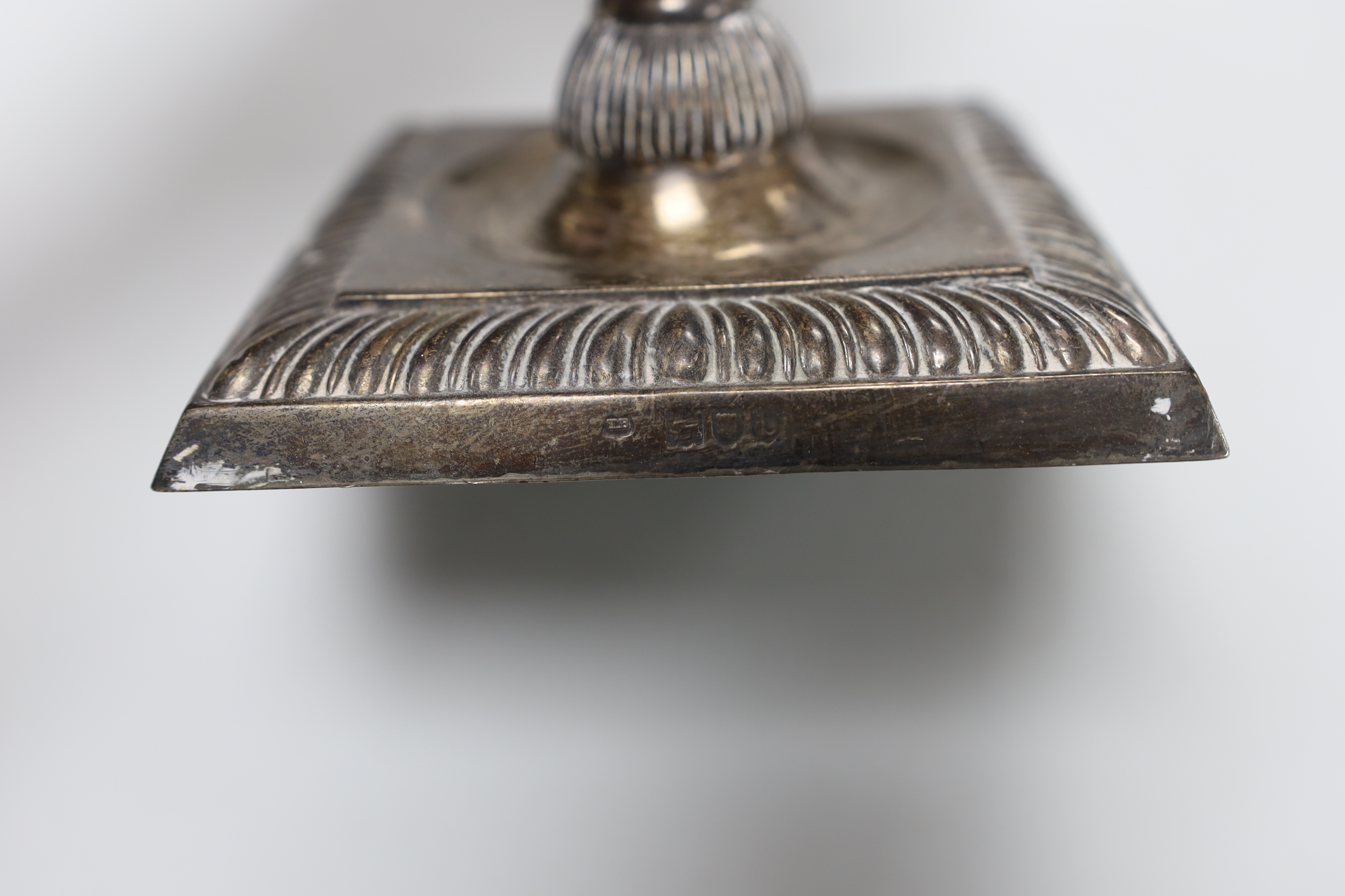 A pair of late Victorian silver candlesticks, with octagonal knopped stems, Thomas Bradbury & Sons, London, 1897, height 23.4cm, weighted.